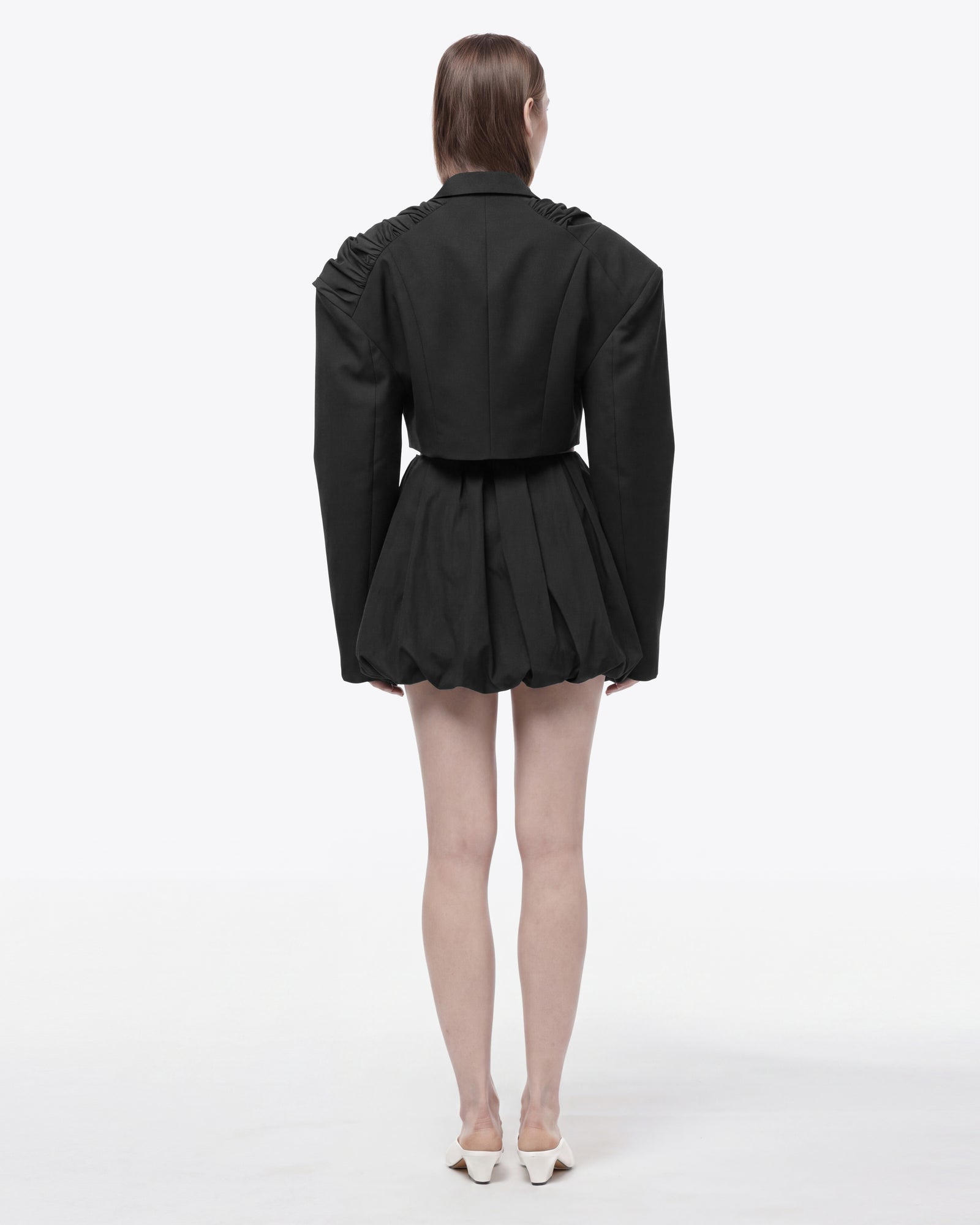 VESTE COURTE À PLIS